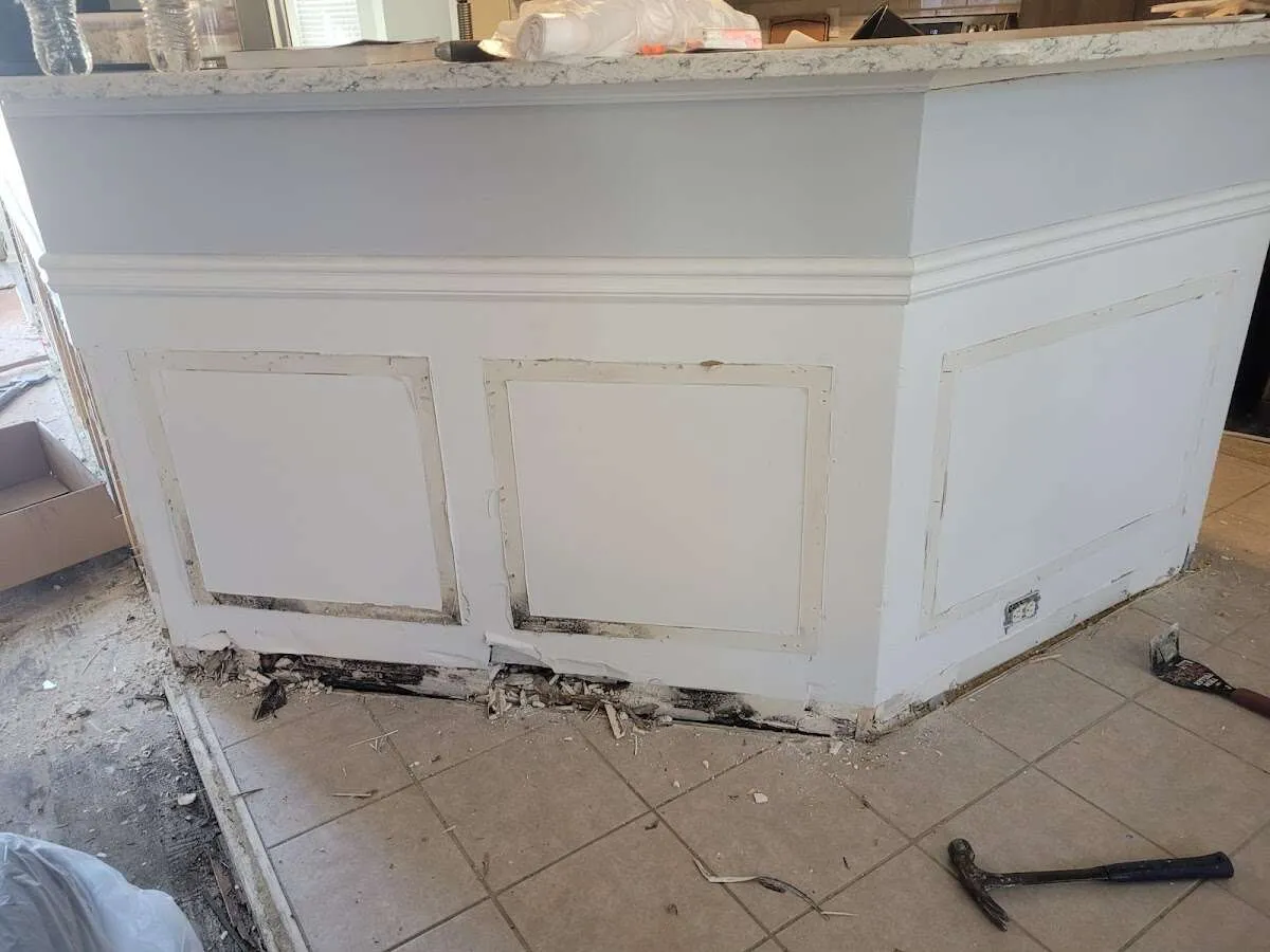 Water damage and mold on kitchen during Storm Damage Restoration in Chesapeake Ranch Estates
